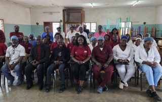 Denis & Lenora Foretia Foundation Team Pose with CASS Staff
